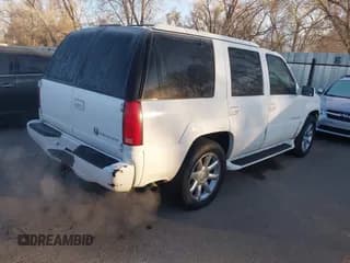 ✅ 2000 Cadillac Escalade • VIN: 1GYEK13R8YR146809 • Lot: 41753964. Listed on IAAI with 156,376 mi. Free auction sales archive from the USA and detailed vehicle history report at DreamBid. Image 4.