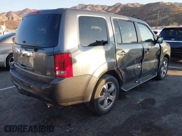 ✅ 2013 Honda Pilot EX-L • VIN: 5FNYF3H77DB038563 • Lot: 41442289. Listed on IAAI with 136,250 mi. Free auction sales archive from the USA and detailed vehicle history report at DreamBid. Image 4.