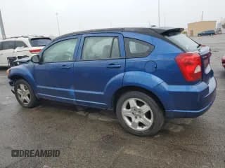 ✅ 2009 Dodge Caliber SXT • VIN: 1B3HB48A29D235671 • Лот: 81558874. Опубликован ранее на Copart с пробегом 153 073 миль. Бесплатный доступ к архиву аукционных продаж из США и подробный отчёт об истории автомобиля на DreamBid. Изображение 2.