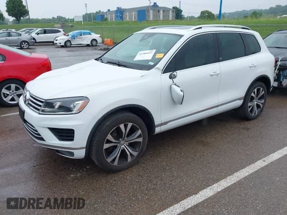 ✅ 2017 Volkswagen Touareg Wolfsburg Edition • VIN: WVGRF7BPXHD002718 • Lot: 42386053. Listed on IAAI with 74,635 mi. Free auction sales archive from the USA and detailed vehicle history report at DreamBid. Image 19.