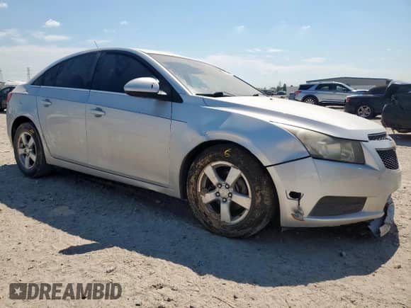 2014 Chevrolet Cruze 1LT with VIN 1G1PC5SB0E7110801, listed as a Copart auction lot 84293085 with 161,826 mi miles and Salvage title. Bid and sale history available at DreamBid. Image 4.