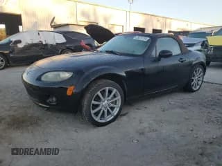 ✅ 2007 Mazda MX-5 Miata Grand Touring • VIN: JM1NC25F570137550 • Lot: 83415134. Wystawiony na Copart z przebiegiem 113 321 mil. Bezpłatny archiwum sprzedaży aukcyjnych z USA i szczegółowy raport historii pojazdu na DreamBid. Zdjęcie 1.