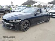 ✅ 2024 BMW 8 Series M850i • VIN: WBAGV8C02RCR25432 • Lot: 42068364. Listed on IAAI with 13,765 mi. Free auction sales archive from the USA and detailed vehicle history report at DreamBid. Image 2.