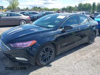 ✅ 2018 Ford Fusion SE • VIN: 3FA6P0LU4JR116474 • Лот: 43151006. Опубликован ранее на IAAI с пробегом 120 258 миль. Бесплатный доступ к архиву аукционных продаж из США и подробный отчёт об истории автомобиля на DreamBid. Изображение 2.