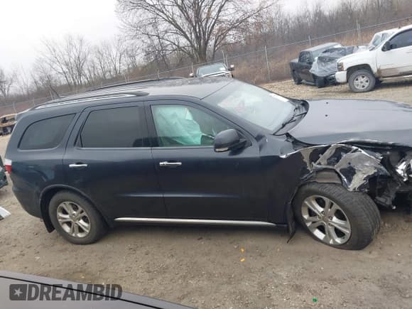 ✅ 2013 Dodge Durango Crew • VIN: 1C4RDJDG7DC686499 • Lot: 43738990. Listed on IAAI with 145,680 mi. Free auction sales archive from the USA and detailed vehicle history report at DreamBid. Image 14.