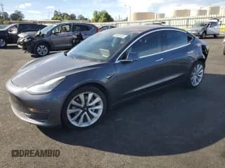 ✅ 2018 Tesla Model 3 Long Range Battery • VIN: 5YJ3E1EB5JF185244 • Lot: 90829255. Wystawiony na Copart z przebiegiem 95 023 mil. Bezpłatny archiwum sprzedaży aukcyjnych z USA i szczegółowy raport historii pojazdu na DreamBid. Zdjęcie 1.