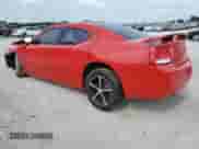 2010 Dodge Charger SXT with VIN 2B3CA3CVXAH228122, listed as a Copart auction lot 63802564 with 198,249 mi miles and Salvage title. Bid and sale history available at DreamBid. Image 2.