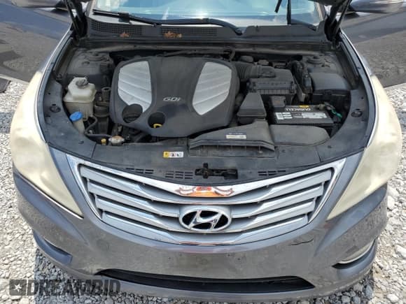 ✅ 2013 Hyundai Azera • VIN: KMHFG4JG9DA254147 • Лот: 64744425. Опубликован ранее на Copart с пробегом 173 015 миль. Бесплатный доступ к архиву аукционных продаж из США и подробный отчёт об истории автомобиля на DreamBid. Изображение 11.