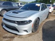 ✅ 2023 Dodge Charger Scat Pack Widebody • VIN: 2C3CDXGJ9PH699759 • Lot: 42824220. Listed on IAAI with 3,338 mi. Free auction sales archive from the USA and detailed vehicle history report at DreamBid. Image 2.
