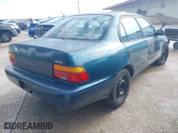 ✅ 1993 Toyota Corolla DLX • VIN: 1NXAE09E8PZ090484 • Lot: 43775718. Listed on IAAI with 256,263 mi. Free auction sales archive from the USA and detailed vehicle history report at DreamBid. Image 4.
