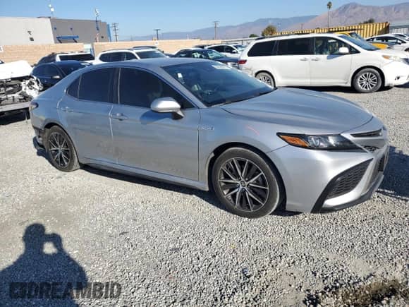 2021 Toyota Camry Hybrid SE с VIN 4T1G31AK7MU556263, выставлен на аукционе Copart как лот 84229075 с пробегом 104 650 миль миль и Списание • Salvage title. История ставок и продаж доступна на DreamBid. Изображение 4.