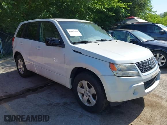✅ 2012 Suzuki Grand Vitara Premium • VIN: JS3TE0D67C4100186 • Lot: 42862856. Listed on IAAI with 133,573 mi. Free auction sales archive from the USA and detailed vehicle history report at DreamBid. Image 1.