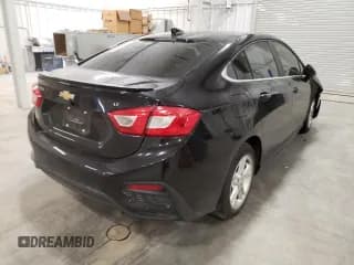 ✅ 2018 Chevrolet Cruze LT • VIN: 1G1BE5SM9J7244349 • Lot: 64478042. Listed on Copart with 72,583 mi. Free auction sales archive from the USA and detailed vehicle history report at DreamBid. Image 4.