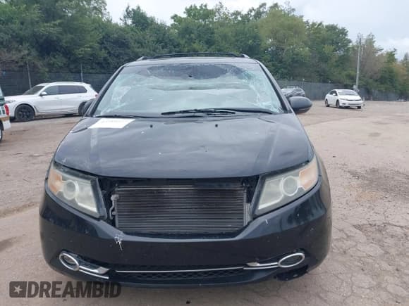 ✅ 2014 Honda Odyssey Touring • VIN: 5FNRL5H99EB005835 • Lot: 43210547. Listed on IAAI with 224,342 mi. Free auction sales archive from the USA and detailed vehicle history report at DreamBid. Image 13.