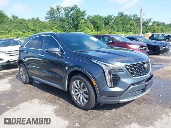 ✅ 2021 Cadillac XT4 FWD Premium Luxury • VIN: 1GYFZCR42MF007617 • Лот: 42437974. Опубликован ранее на IAAI с пробегом 126 071 миль. Бесплатный доступ к архиву аукционных продаж из США и подробный отчёт об истории автомобиля на DreamBid. Изображение 1.