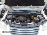 ✅ 2010 Chrysler Town & Country Touring • VIN: 2A4RR5D14AR133746 • Lot: 42116450. Listed on IAAI with 221,775 mi. Free auction sales archive from the USA and detailed vehicle history report at DreamBid. Image 10.