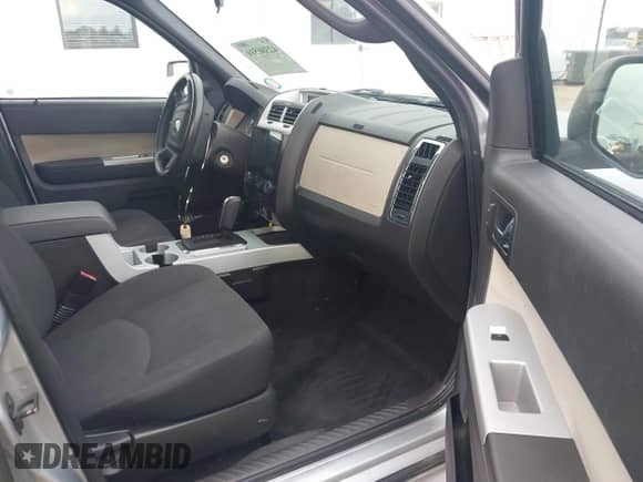 2010 Mercury Mariner with VIN 4M2CN8B76AKJ09411, listed as a IAAI auction lot 42386510 with 113,126 mi miles and . Bid and sale history available at DreamBid. Image 5.