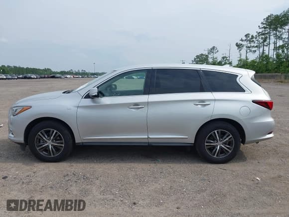 ✅ 2020 Infiniti QX60 Luxe • VIN: 5N1DL0MN9LC528083 • Lot: 42414461. Listed on IAAI with 87,812 mi. Free auction sales archive from the USA and detailed vehicle history report at DreamBid. Image 14.