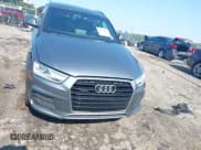 ✅ 2017 Audi Q3 Premium Plus • VIN: WA1JCCFS8HR003056 • Lot: 42570081. Listed on IAAI with 82,210 mi. Free auction sales archive from the USA and detailed vehicle history report at DreamBid. Image 12.