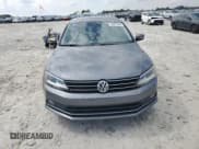 ✅ 2015 Volkswagen Jetta SE • VIN: 3VWD07AJ8FM318503 • Lot: 82072295. Listed on Copart with 77,037 mi. Free auction sales archive from the USA and detailed vehicle history report at DreamBid. Image 5.