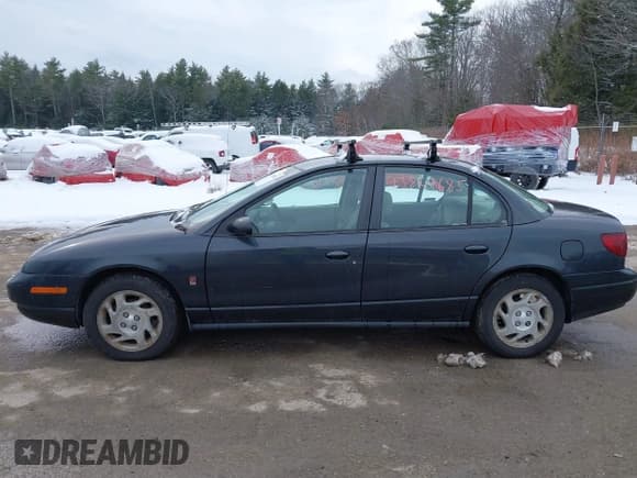 ✅ 2002 Saturn SL • VIN: 1G8ZK527X2Z197969 • Lot: 43824685. Listed on IAAI with 150,270 mi. Free auction sales archive from the USA and detailed vehicle history report at DreamBid. Image 12.