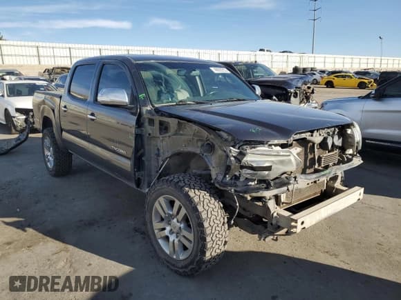 ✅ 2015 Toyota Tacoma • VIN: 3TMLU4EN3FM165978 • Lot: 49920255. Wystawiony na Copart z przebiegiem 134 974 mil. Bezpłatny archiwum sprzedaży aukcyjnych z USA i szczegółowy raport historii pojazdu na DreamBid. Zdjęcie 4.