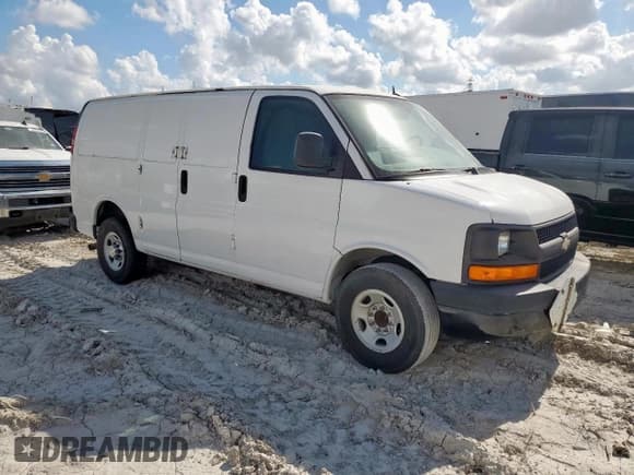 ✅ 2015 Chevrolet Express Cargo • VIN: 1GCWGFCF8F1154130 • Lot: 85589955. Listed on Copart with 101,000 mi. Free auction sales archive from the USA and detailed vehicle history report at DreamBid. Image 4.