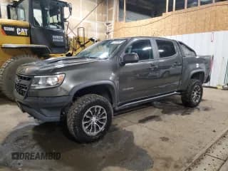 ✅ 2018 Chevrolet Colorado 4WD ZR2 • VIN: 1GCGTEEN0J1176761 • Лот: 85403655. Опубликован ранее на Copart с пробегом 49 017 миль. Бесплатный доступ к архиву аукционных продаж из США и подробный отчёт об истории автомобиля на DreamBid. Изображение 1.