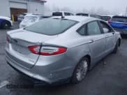 ✅ 2015 Ford Fusion S Hybrid • VIN: 3FA6P0UU3FR116522 • Lot: 43840795. Listed on IAAI with 170,901 mi. Free auction sales archive from the USA and detailed vehicle history report at DreamBid. Image 4.