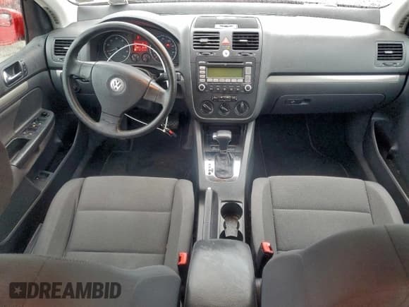 ✅ 2009 Volkswagen Rabbit S • VIN: WVWDB71K69W041361 • Lot: 94955015. Listed on Copart with 108,824 mi. Free auction sales archive from the USA and detailed vehicle history report at DreamBid. Image 8.