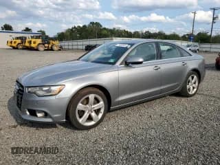 ✅ 2012 Audi A6 Premium Plus • VIN: WAUDFAFC0CN165705 • Lot: 71905845. Listed on Copart with 210,069 mi. Free auction sales archive from the USA and detailed vehicle history report at DreamBid. Image 1.