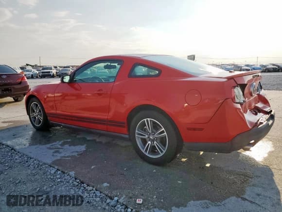 ✅ 2011 Ford Mustang Premium • VIN: 1ZVBP8AM0B5119867 • Lot: 80852775. Listed on Copart with 140,720 mi. Free auction sales archive from the USA and detailed vehicle history report at DreamBid. Image 2.
