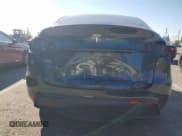 ✅ 2024 Tesla Model Y • VIN: 7SAYGDED3RF118899 • Lot: 87443625. Wystawiony na Copart z przebiegiem 28 225 mil. Bezpłatny archiwum sprzedaży aukcyjnych z USA i szczegółowy raport historii pojazdu na DreamBid. Zdjęcie 6.