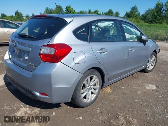 ✅ 2016 Subaru Impreza Premium • VIN: JF1GPAB65G8270778 • Lot: 42891616. Listed on IAAI with 77,071 mi. Free auction sales archive from the USA and detailed vehicle history report at DreamBid. Image 4.