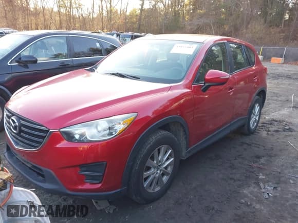 ✅ 2016 Mazda CX-5 Sport • VIN: JM3KE4BY3G0602140 • Lot: 43855403. Listed on IAAI with 169,571 mi. Free auction sales archive from the USA and detailed vehicle history report at DreamBid. Image 18.
