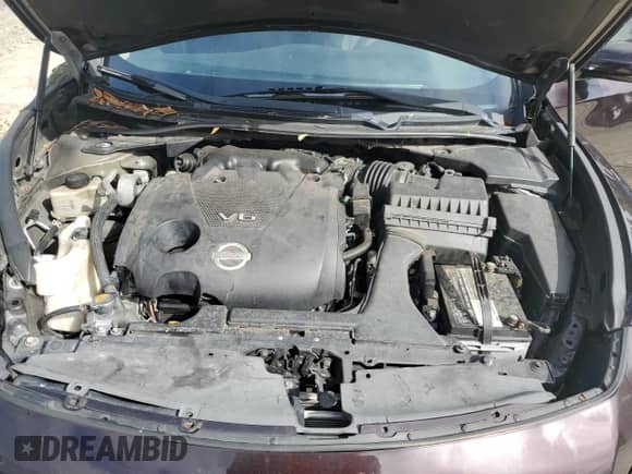 2013 Nissan Maxima SV с VIN 1N4AA5AP8DC801019, выставлен на аукционе Copart как лот 86276025 с пробегом Не указан миль и Списание • Salvage title. История ставок и продаж доступна на DreamBid. Изображение 11.