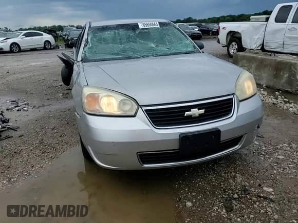 2006 Chevrolet Malibu Maxx LS z VIN 1G1ZS618X6F167568, wystawiony jako Copart lot #65650665 z przebiegiem 139 395 mil mil oraz Szkoda całkowita • Salvage title. Historia ofert i sprzedaży dostępna na DreamBid. Obrazek 13.