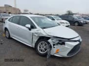 ✅ 2022 Toyota Corolla Hybrid LE • VIN: JTDEAMDE5N3002770 • Лот: 43298679. Опубликован ранее на IAAI с пробегом 104 268 миль. Бесплатный доступ к архиву аукционных продаж из США и подробный отчёт об истории автомобиля на DreamBid. Изображение 1.