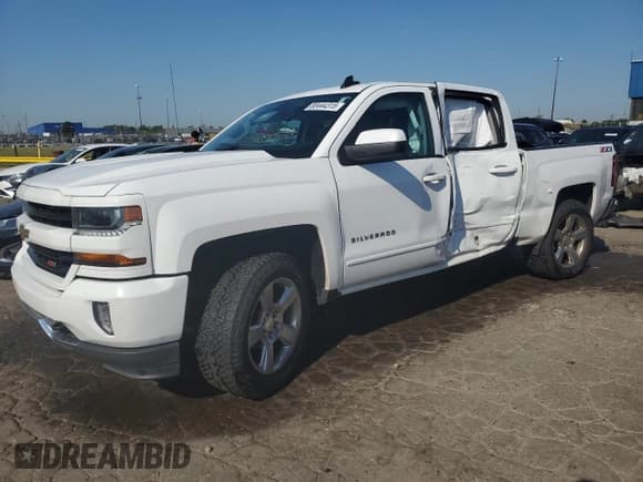 ✅ 2018 Chevrolet Silverado 1500 LT • VIN: 3GCUKRECXJG218009 • Лот: 80444315. Опубликован ранее на Copart с пробегом 118 812 миль. Бесплатный доступ к архиву аукционных продаж из США и подробный отчёт об истории автомобиля на DreamBid. Изображение 1.