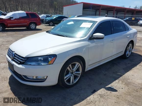 ✅ 2014 Volkswagen Passat SEL Premium • VIN: 1VWCT7A36EC042861 • Lot: 41941182. Listed on IAAI with 178,813 mi. Free auction sales archive from the USA and detailed vehicle history report at DreamBid. Image 2.