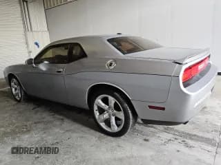 ✅ 2014 Dodge Challenger SXT Plus • VIN: 2C3CDYAGXEH171972 • Lot: 83479264. Wystawiony na Copart z przebiegiem 151 405 mil. Bezpłatny archiwum sprzedaży aukcyjnych z USA i szczegółowy raport historii pojazdu na DreamBid. Zdjęcie 2.
