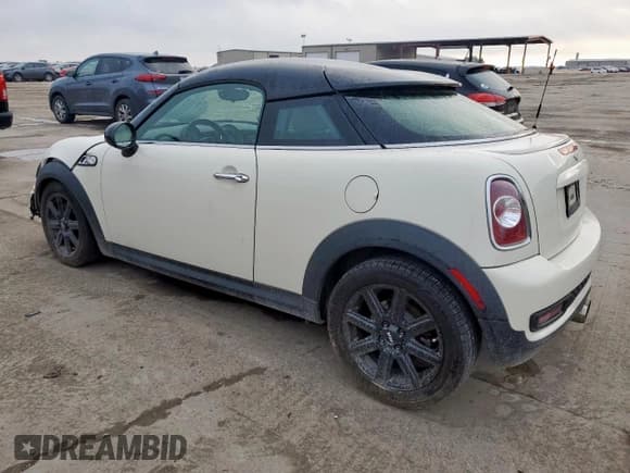 ✅ 2014 MINI Coupe S • VIN: WMWSX3C52ET772662 • Лот: 59119415. Опубликован ранее на Copart с пробегом 113 014 миль. Бесплатный доступ к архиву аукционных продаж из США и подробный отчёт об истории автомобиля на DreamBid. Изображение 2.