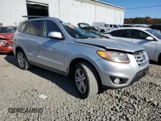 ✅ 2011 Hyundai Santa Fe SE • VIN: 5XYZH4AG0BG006848 • Lot: 76559544. Listed on Copart with 154,630 mi. Free auction sales archive from the USA and detailed vehicle history report at DreamBid. Image 4.