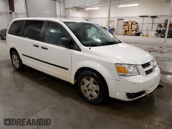 2008 Dodge Grand Caravan SE с VIN 2D8HN44H58R798560, выставлен на аукционе Copart как лот 82343315 с пробегом 187 284 миль миль и Списание • Salvage title. История ставок и продаж доступна на DreamBid. Изображение 4.