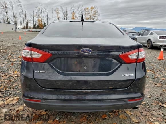 ✅ 2016 Ford Fusion S Hybrid • VIN: 3FA6P0UU1GR118805 • Lot: 93336205. Wystawiony na Copart z przebiegiem 141 238 mil. Bezpłatny archiwum sprzedaży aukcyjnych z USA i szczegółowy raport historii pojazdu na DreamBid. Zdjęcie 6.