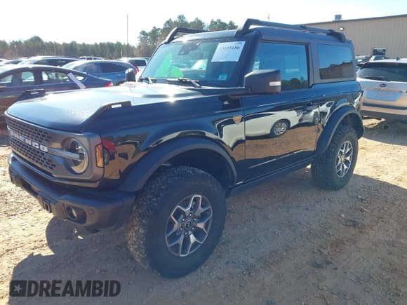 ✅ 2023 Ford Bronco • VIN: 1FMDE5CP7PLB01355 • Lot: 43801686. Listed on IAAI with 52,398 mi. Free auction sales archive from the USA and detailed vehicle history report at DreamBid. Image 2.