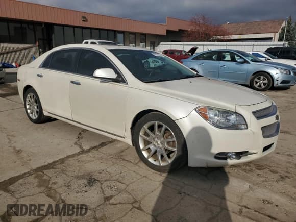 ✅ 2010 Chevrolet Malibu LTZ • VIN: 1G1ZE5E77AF302727 • Lot: 82566644. Listed on Copart with 203,019 mi. Free auction sales archive from the USA and detailed vehicle history report at DreamBid. Image 4.