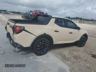 2022 Hyundai Santa Cruz SEL с VIN 5NTJBDAE6NH001794, выставлен на аукционе Copart как лот 79401464 с пробегом 59 515 миль миль и На запчасти • Non repairable. История ставок и продаж доступна на DreamBid. Изображение 3.