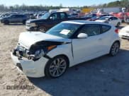 ✅ 2013 Hyundai Veloster w/Black Int • VIN: KMHTC6AD8DU135634 • Lot: 41301184. Listed on IAAI with 156,510 mi. Free auction sales archive from the USA and detailed vehicle history report at DreamBid. Image 2.