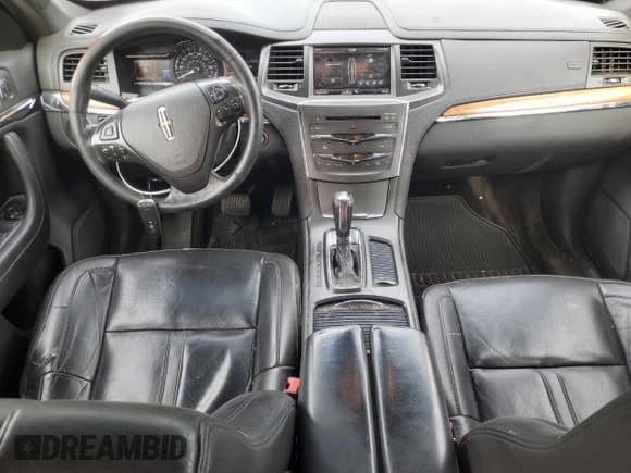 ✅ 2014 Lincoln MKS • VIN: 1LNHL9DK4EG601125 • Лот: 81664005. Опубликован ранее на Copart с пробегом 311 939 миль. Бесплатный доступ к архиву аукционных продаж из США и подробный отчёт об истории автомобиля на DreamBid. Изображение 8.